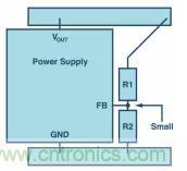 如何使用电源设计中的分压器调节输出电压？